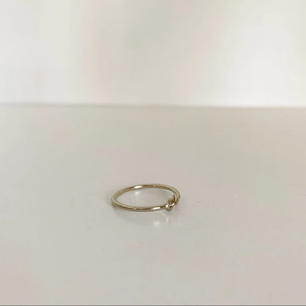 NWOT Mini knotted infinity ring